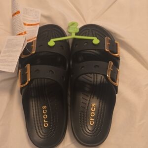 CROCS WOMAN SATURDAY Sandals in Black with Gold BUCKLE